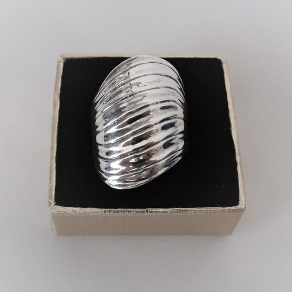 large modern all silver ring