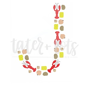 May include: A red, white, and yellow letter J made of crawfish, corn, and potatoes. The letter is surrounded by a white background.