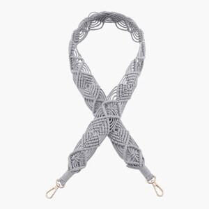 May include: A gray macrame strap with gold metal clasps. The strap is made of a thick, woven cord and has a diamond pattern.