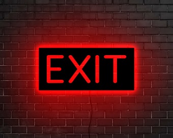 May include: Red neon sign with the word "EXIT" on a black background against a brick wall.