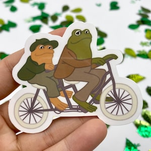 Sticker grenouille et crapaud à vélo
