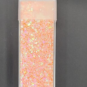 Grosses paillettes orange vif et roses