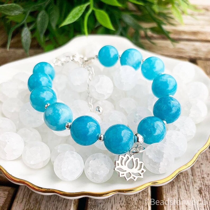 Signature gemstone bracelet with sterling silver lotus pendant