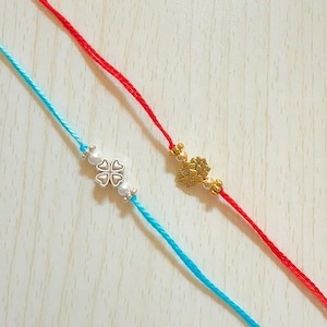 Simple Silver/Gold Clover Lotus Rakhis, Blue & Red Minimalist Flower Rakhis, Colorful Rakhis to Send to Brother or Kids, 1-2 Pack of Rakhris