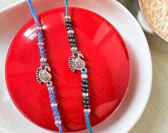 Blue Cotton Rakhi Set: Silver Peacock, Modern Raksha Bandhan Bracelet for Sibling, Beadeded Rakhris Punjabi, 2 Pack Mohr Rakhees Simple Gift