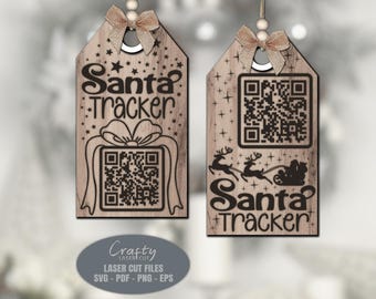May include: Two wooden Christmas ornaments with the text "Santa Tracker" and QR codes. One ornament features a gift box design, and the other shows Santa's sleigh with reindeer. Each ornament has a decorative bow.