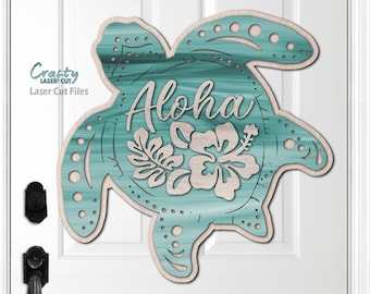 May include: A teal blue wooden turtle cutout with the word "Aloha" and a white hibiscus flower.