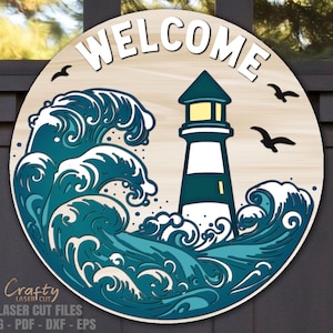 May include: A round wooden sign with the word "WELCOME" in white letters. The sign features a blue and white lighthouse with waves crashing around it. The sign is perfect for a nautical themed home.