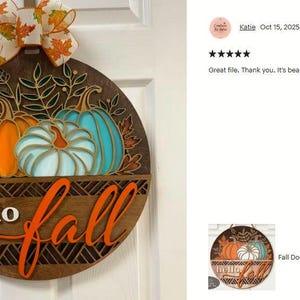 A Hello Fall Door Hanger SVG Laser Cut File with a Floral Pumpkin Welcome Sign SVG theme including a trio of pumpkins and fall leaves in a basket for use with your Glowforge, XTool and other laser machines.