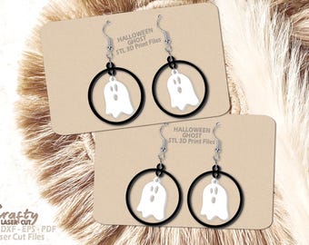 May include: Two pairs of black hoop earrings with a white ghost cutout design. The earrings are displayed on a brown card with the text "Halloween Ghost STL 3D Print Files".