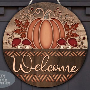 Pumkin door hanger SVG laser cut files; a fall welcome sign svg with mushroom and floral bouquet for Glowforge and XTool laser machines.