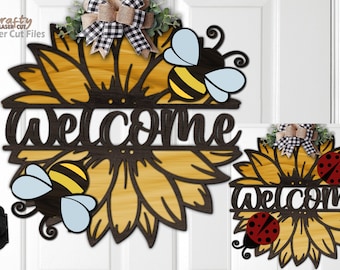 Op de afbeelding: Een houten welkomstbord met een zonnebloemontwerp. De zonnebloem heeft een houtnerftextuur en wordt omringd door twee bijen. Het woord "welkom" is geschreven in een zwart handschrift.