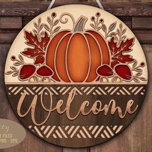 Thanksgiving pumpkin welcome sign SVG laser cut files; a fall door hanger SVG with a Floral Basket Fall Door Sign design for Glowforge and XTool laser machines