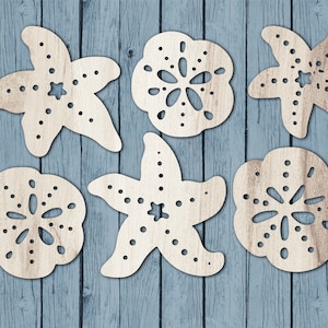 May include: Six wooden cutouts of seashells and starfish, perfect for crafting projects. The cutouts are in a natural wood color and have a rustic, beachy feel.