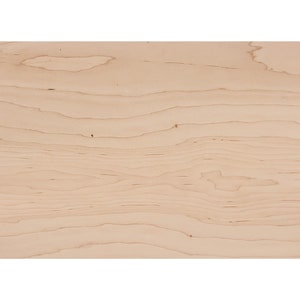 May include: Close-up of a light-colored wooden surface with visible grain patterns. The wood has a natural, warm tone with subtle variations in color and texture. The grain runs horizontally across the frame.