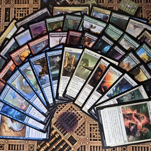 50 Card MTG Mystery Pack – 5 Guaranteed Rares – Magic: The Gathering Bulk Lot – No Duplicates Commander Deckbuilding Random Sets & Colors
