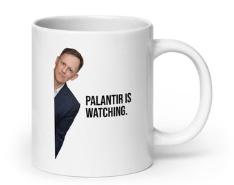 Palantir obserwuje biały błyszczący kubek