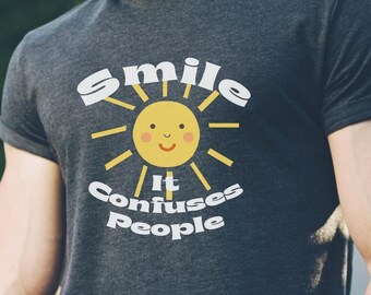 Funny Happy People Shirt, Smile It Confuses People Unisex Graphic Shirt, Fun Shirts for Gifts, Bright Uplifting Inspiring Shirt, Sarcastic
