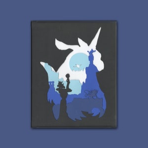 May include: A blue and white paper cut-out art piece depicting a mythical creature with a horn, a moon, and a silhouette of a person standing on a rock.