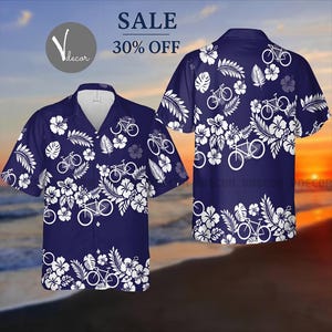 May include: Navy blue short-sleeve shirt with a white bicycle and floral pattern. The shirt has a button-down collar and is decorated with white flowers and leaves. The text "SALE 30% OFF" is visible in the upper right corner.