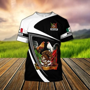 May include: A black, white, and green 3D printed t-shirt with a stylized image of roosters, an eagle, and the Mexican flag. The text "YOUR NAME" is printed on the shirt.