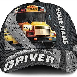 May include: A black baseball cap with a yellow school bus design. The cap displays the words "SCHOOL BUS DRIVER" on the brim and "YOUR NAME" on the side. The background has a diamond plate pattern.
