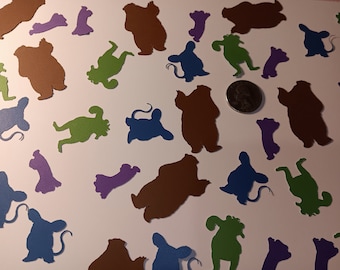 May include: Assortment of colorful paper cutouts of various animals, including bears, mice, and turtles. The cutouts are in shades of brown, green, blue, and purple.