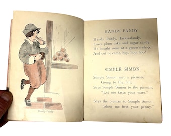 May include: An open book with illustrations and text. The left page features a boy in a hat and coat. The right page displays the text "HANDY PANDY" and "SIMPLE SIMON", classic nursery rhymes.
