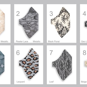 May include: Collection of eight face masks with various lace patterns. Designs include gold swirl, pewter lace, black floral, geo lace, teal smoke, leopard, leaf, and beige flora. Each mask is displayed on a white background.