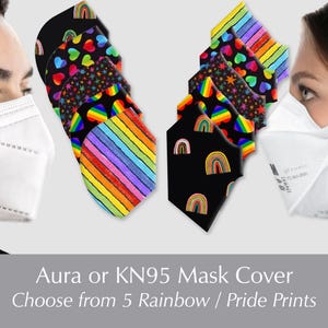 May include: A collection of Aura or KN95 mask covers with rainbow and Pride-themed designs. The masks feature colorful patterns including rainbows, hearts, stars, and stripes. The image also shows two people wearing white masks.