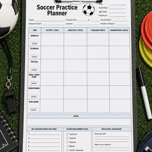 May include: A black clipboard holding a white Soccer Practice Planner sheet with sections for time, activity, objective, coaching points, and notes. The form includes fields for date, team, age group, and player development focus, measuring 21.6 by 27.9 cm.