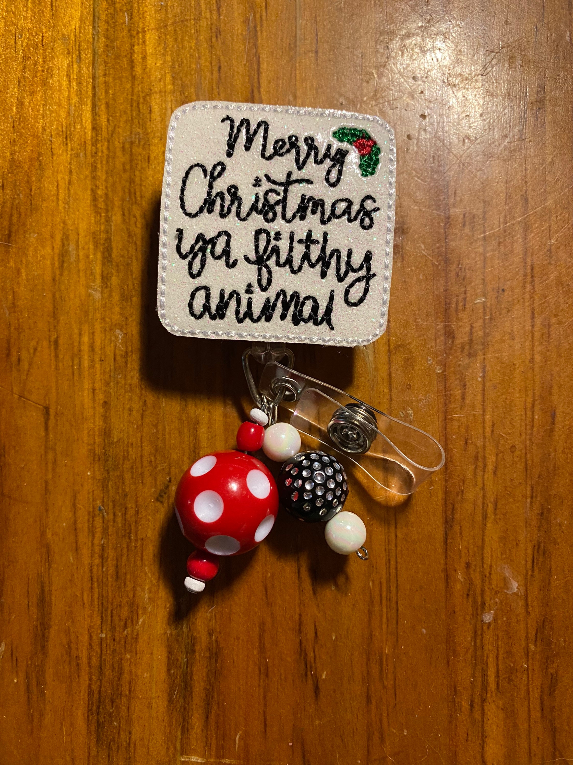 Merry Christmas you filthy animal badge reel | Etsy