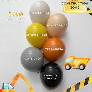 May include: A set of 7 construction themed balloons in various colors, including charcoal black, slate grey, terracotta, peachy beige, lemon ginger, and malted milk. The balloons are arranged in a circle around a construction zone sign. The text "THE CONSTRUCTION ZONE" is written on the sign. The balloons are perfect for a construction themed party.