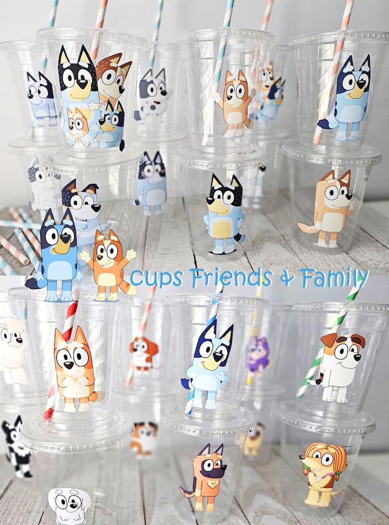 May include: Clear plastic cups with lids and straws, decorated with cartoon dog characters. The cups feature various dog designs, and the text "Cups Friends + Family" is visible. The straws have colorful stripes.