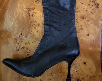 Women's stiletto leather knee high boots