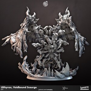 May include: A detailed, grey, 3D printed miniature of a multi-eyed, winged creature with a large central eye. The creature is standing on a rocky base and has a text label that reads "Ulthyrax, Voidbound Scourge 697".