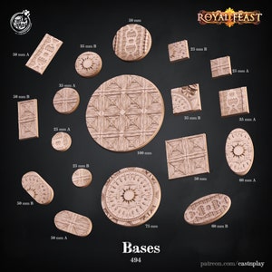May include: A set of 10 different sized round and rectangular wooden bases for miniature figures. The bases feature intricate designs and are labeled with their size in millimeters. The bases are part of the Royal Feast collection by Cast N Play.