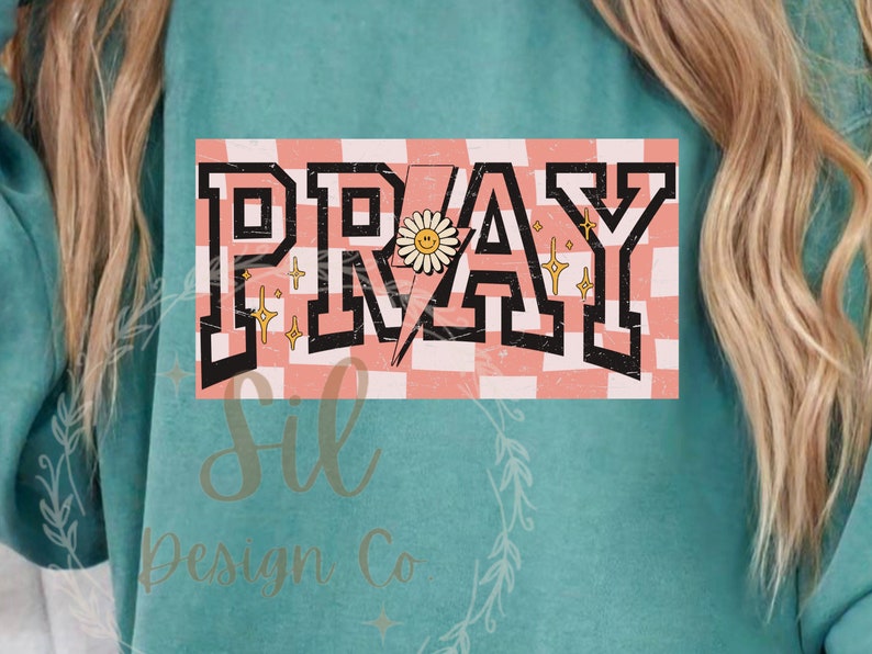 May include: A pink and white checkered background with the word "PRAY" in black block letters. A yellow lightning bolt with a smiley face daisy is in the centre of the word.