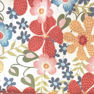 May include: Floral fabric with a white background, featuring large red, pink, and orange flowers. Smaller blue and pink flowers are scattered throughout, with green leaves and stems. The fabric has a dotted border.