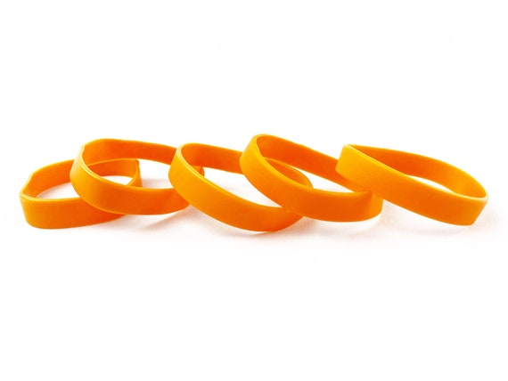 Orange rubber bracelet discount