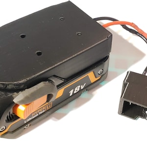 May include: A black and orange 18V battery pack with a black connector and a wire. The battery pack has a label that says "HYPER LI Lithium Ion".