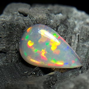Ethiopian Welo Opal Gemstone: 2.70 Carat Pear Cabochon, AAA Quality