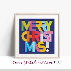 May include: A cross stitch pattern featuring the words "Merry Christmas!" in a colorful, geometric style. The letters are arranged in a stacked formation, with each letter made up of different colors and patterns. The background is a dark blue.