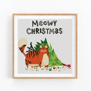 以下が含まれることがあります： 「MEOWY CHRISTMAS」というテキストと共に、クリスマスツリーの下に座っている猫を描いたクロスステッチパターンです。
