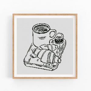 以下が含まれることがあります： トレイの上に置かれたコーヒーカップ、クロワッサン、小さな瓶の白黒の線画。シンプルでミニマルなスタイルの画像です。