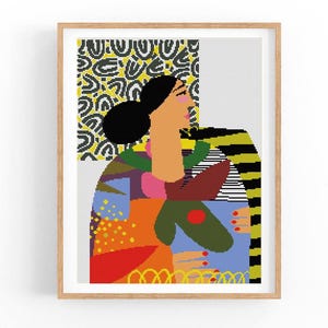 May include: A colorful abstract portrait of a woman with a black and yellow patterned background. The woman has a black bob haircut and is wearing a colorful geometric patterned shirt.