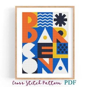 May include: A framed cross-stitch pattern featuring the word "Barcelona" in bold, geometric letters. The design uses a vibrant palette of orange, blue, yellow, and white. The text "Cross Stitch Pattern PDF" is at the bottom.