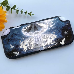 May include: A black and blue Switch case featuring a carousel design with white horses, a striped canopy, and a night sky background. White doves are scattered around the carousel. A yellow sunflower and green leaves are in the upper left corner.