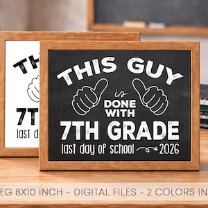 May include: Two framed chalkboard-style signs with the text "THIS GUY is DONE WITH 7TH GRADE last day of school 2026". The signs are in wooden frames and are displayed on a wooden surface.