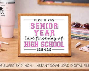 May include: A rectangular wooden frame containing a white sign with black and pink text that reads: CLASS OF 2027, SENIOR YEAR, last first day of HIGH SCHOOL, 2026-2027. The sign is an 8x10 inch digital file available for instant download.